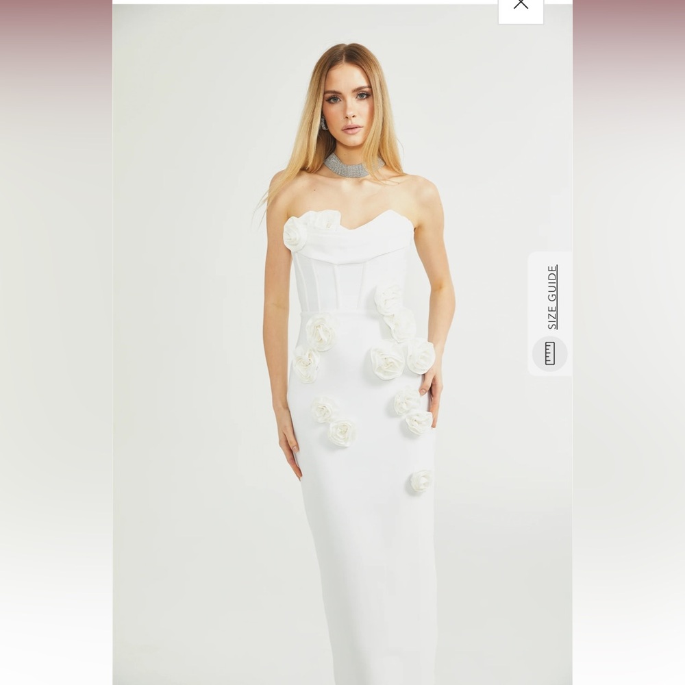 White bandage maxi dress with rosette embellishment